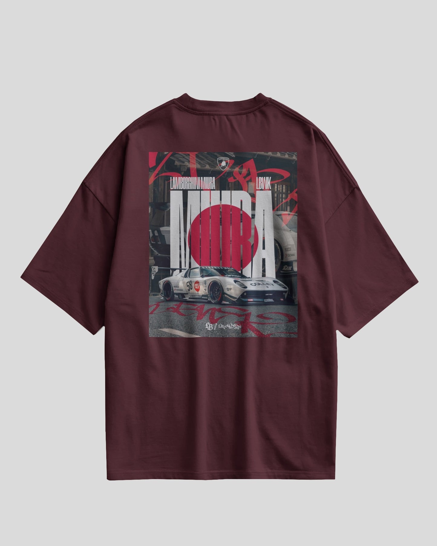 Maroon t-shirt with graphic design on a gray background