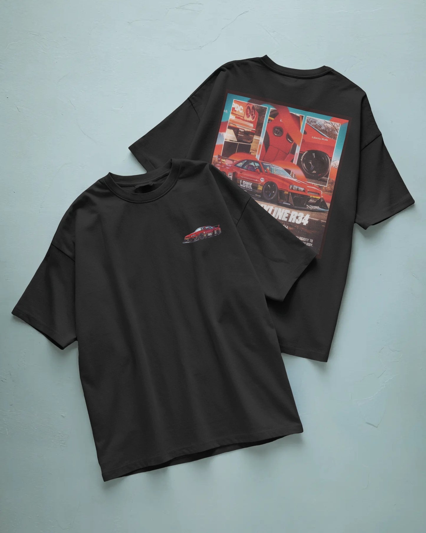 Two Colour_Black t-shirts with graphic designs on a light blue background
