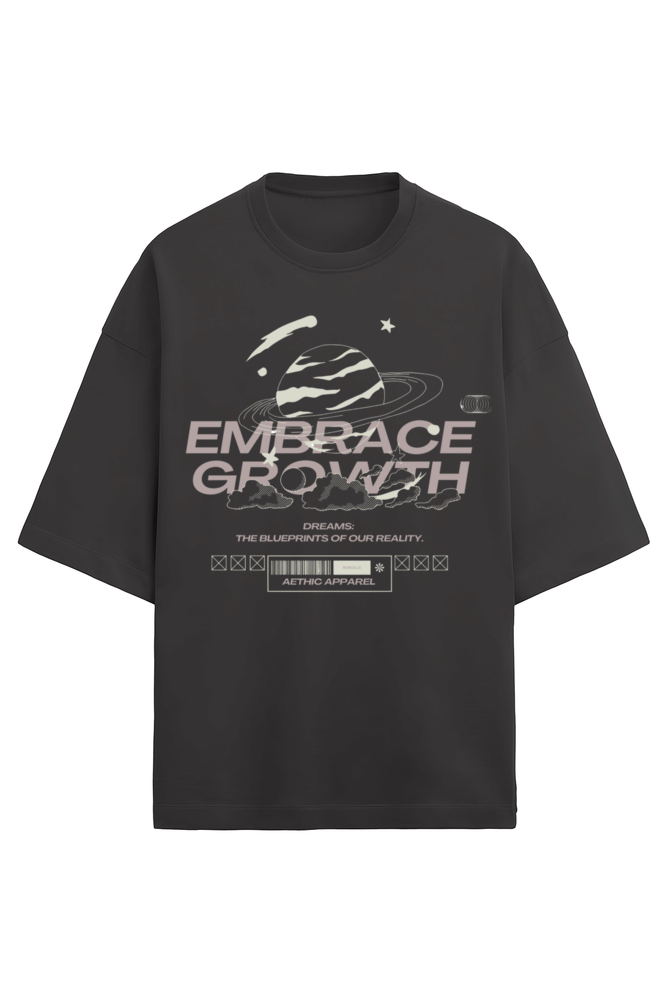 Black t-shirt with space-themed graphic and 'Embrace Growth' text on a white background
