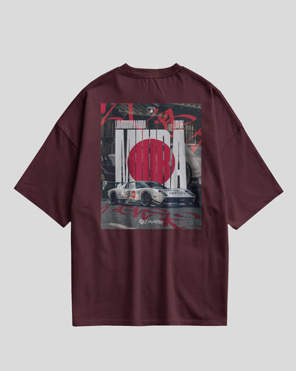 Maroon t-shirt with graphic design on a gray background