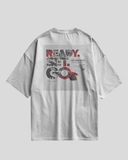 White oversized t-shirt with Ready Set Go graphic design on the back and Aethic Studios text on the front
