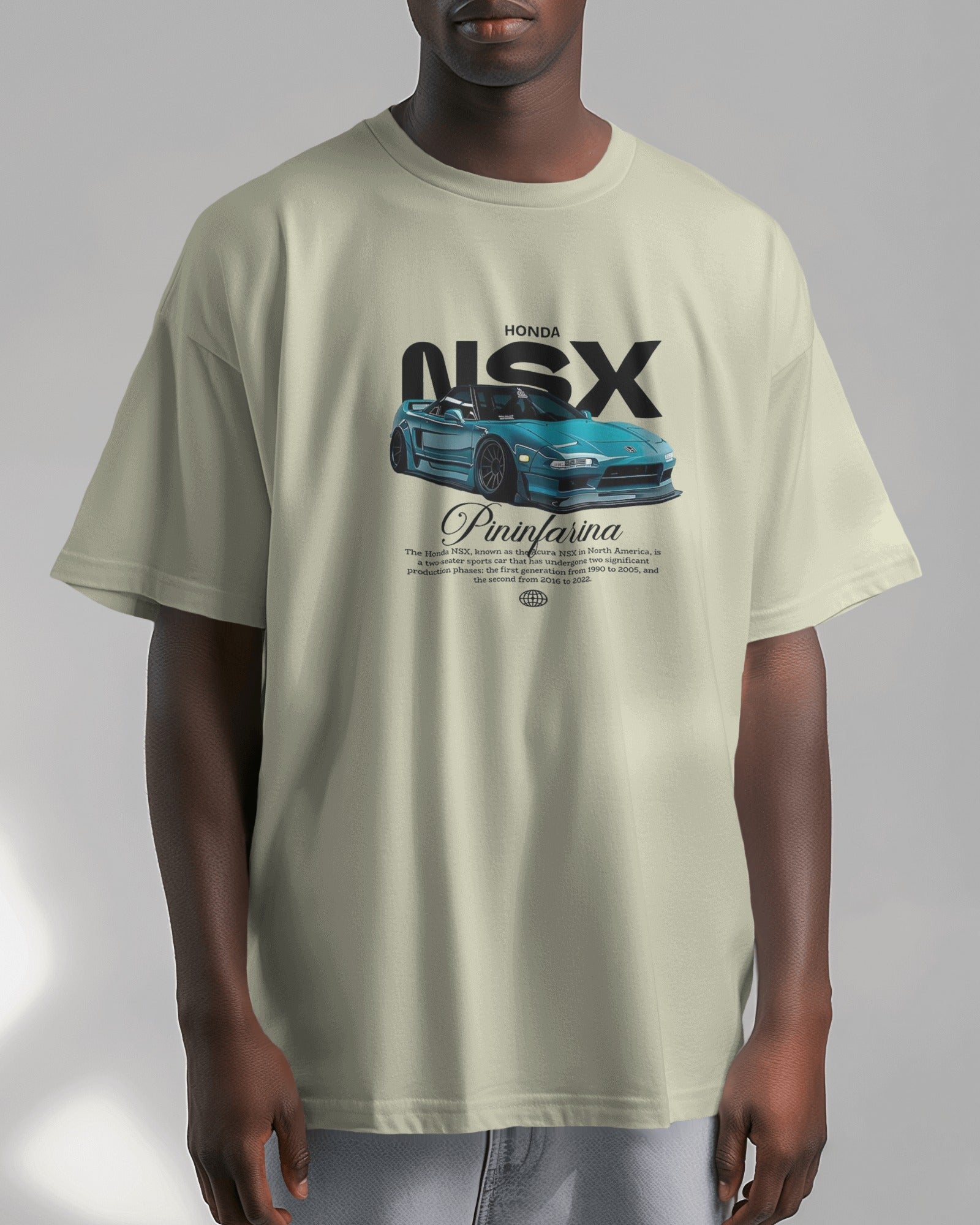 Person wearing a off white t-shirt with a Honda NSX graphic on a gray background