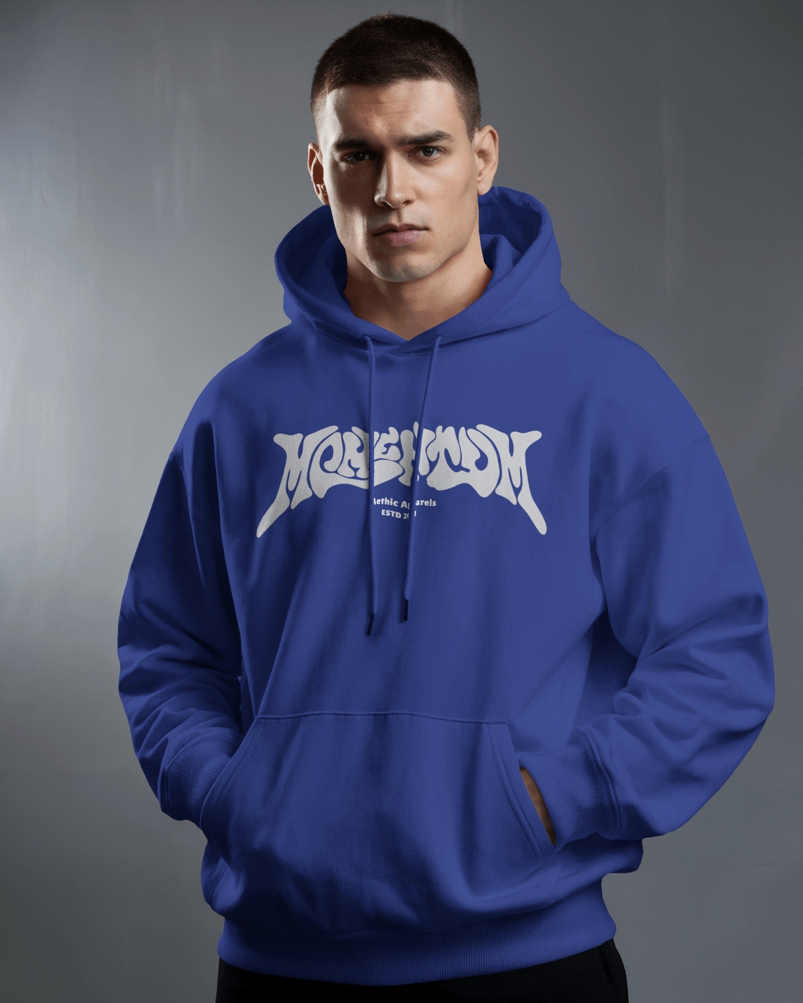Man wearing a blue hoodie with a white logo on a gray background