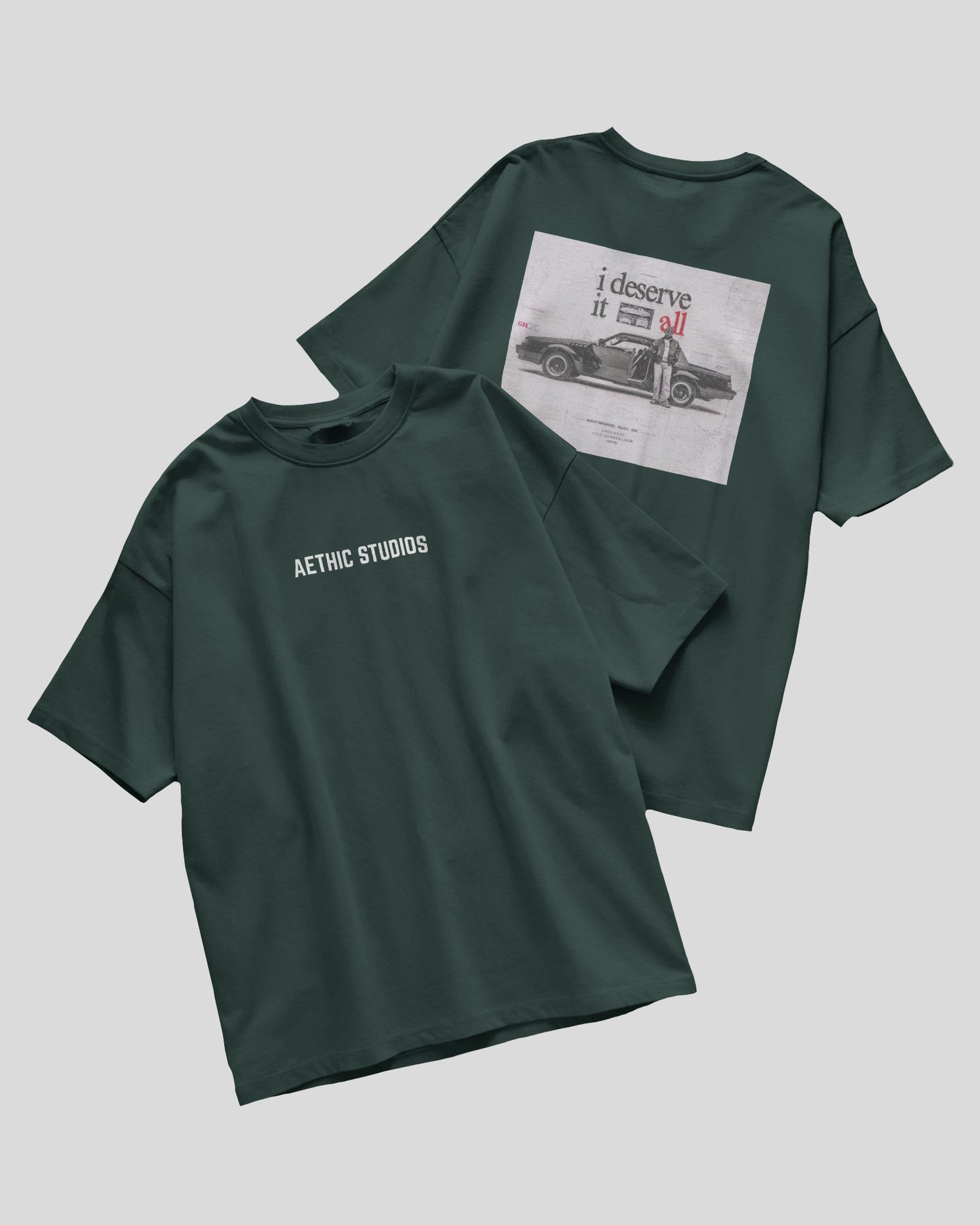 oversized t-shirt with Attack Mode graphic and race car design on the back and Aethic Studios text on the front