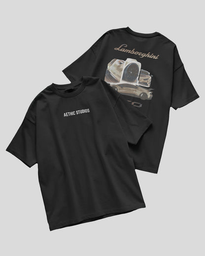 Two black t-shirts with graphic designs and text on a light gray background