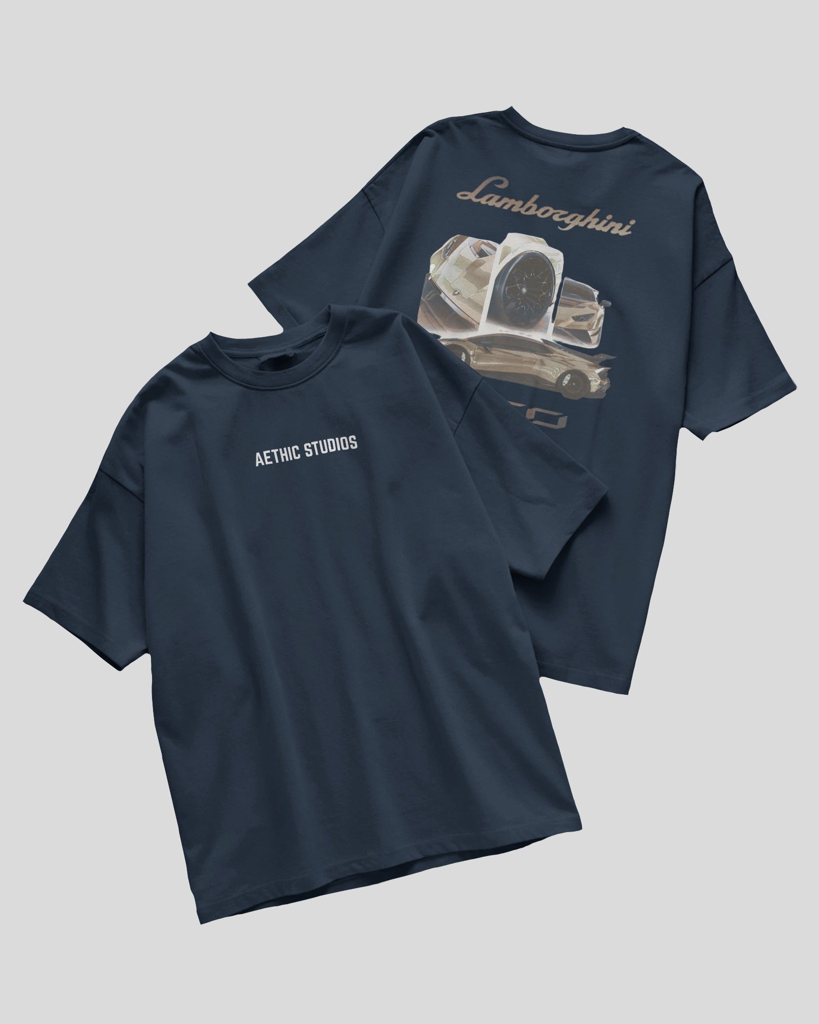 Two navy blue t-shirts with graphic designs on a light gray background