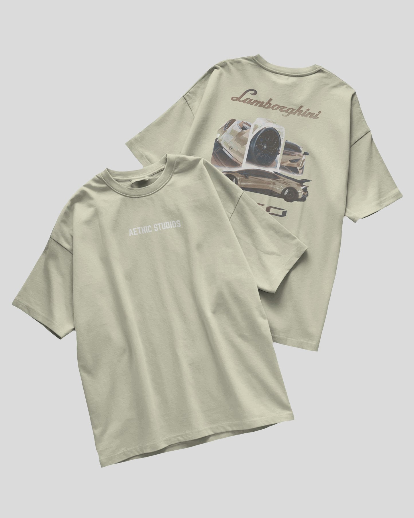 Two light green t-shirts with 'Lamborghini' branding on a gray background