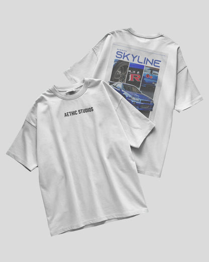 White t-shirt with 'Aesthetic Studios' on the front and 'SKYLINE' graphic on the back, displayed on a light gray background.