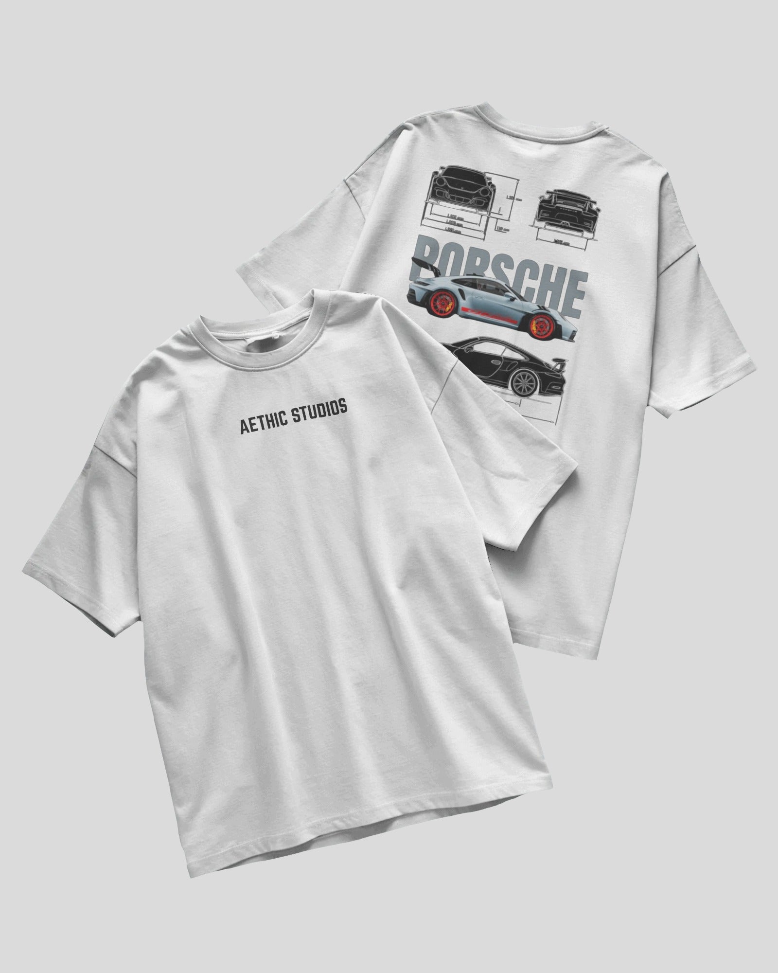 White t-shirt with Porsche graphic on a light gray background