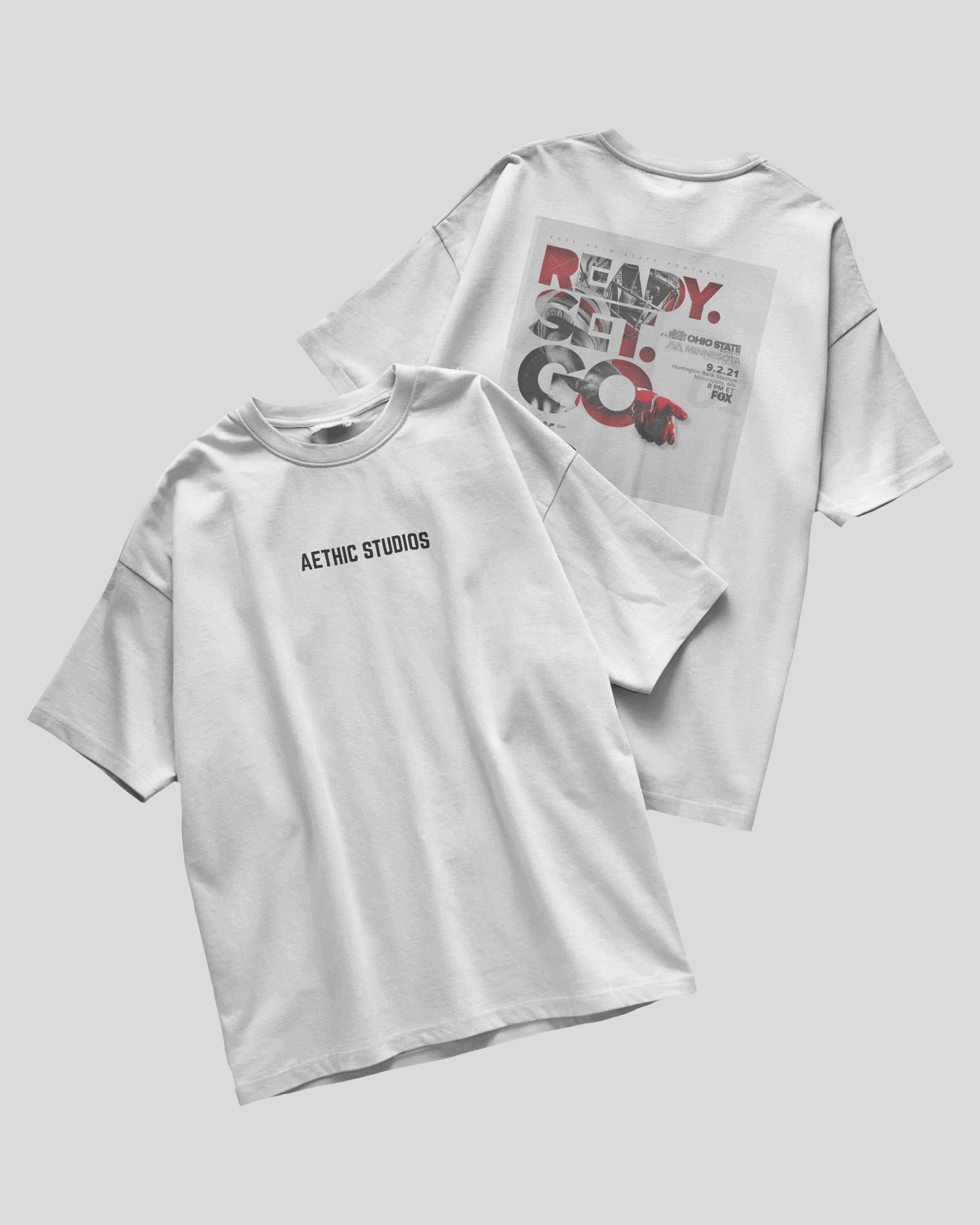 White oversized t-shirt with Ready Set Go graphic design on the back and Aethic Studios text on the front