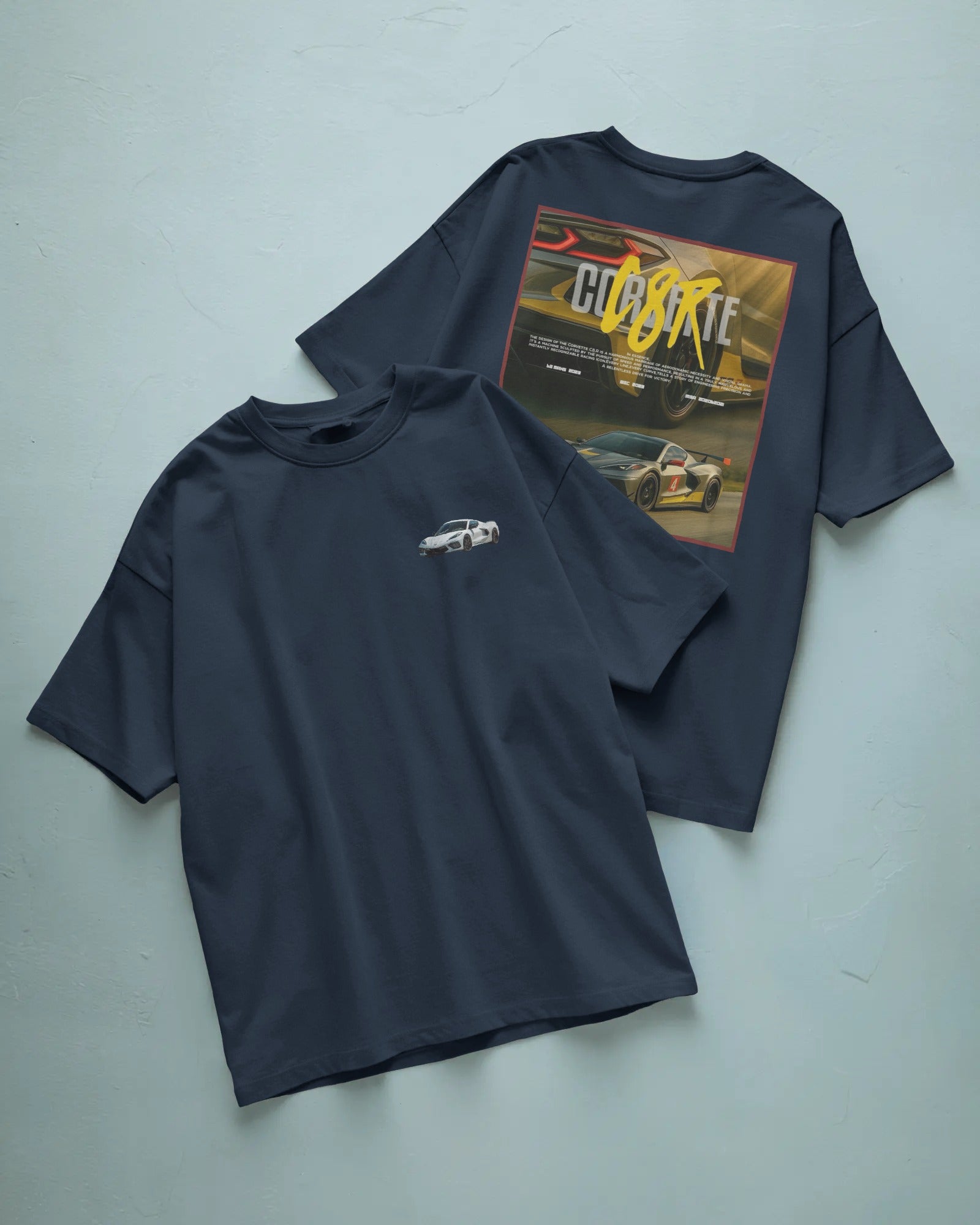 Two Colour_Navyblue t-shirts with car graphics on a light gray background