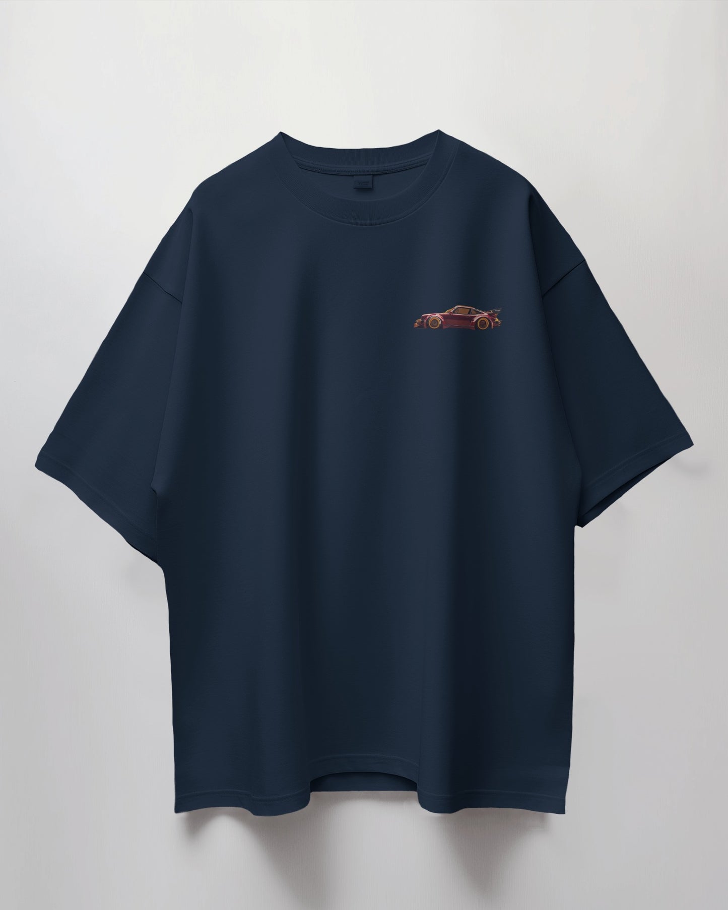 Colour_Navyblue t-shirt with a small brown logo on a light gray background