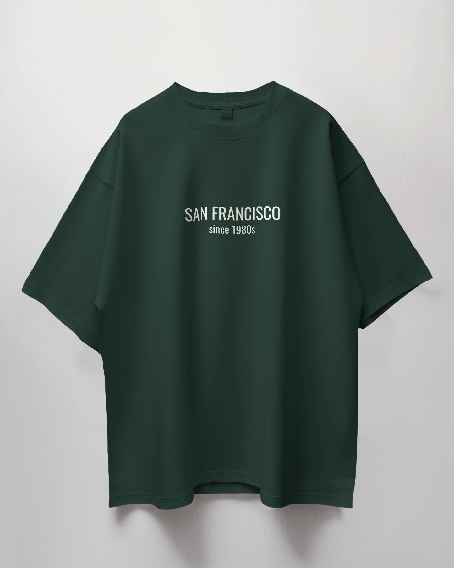 Green t-shirt with 'San Francisco since 1980s' text on a light gray background