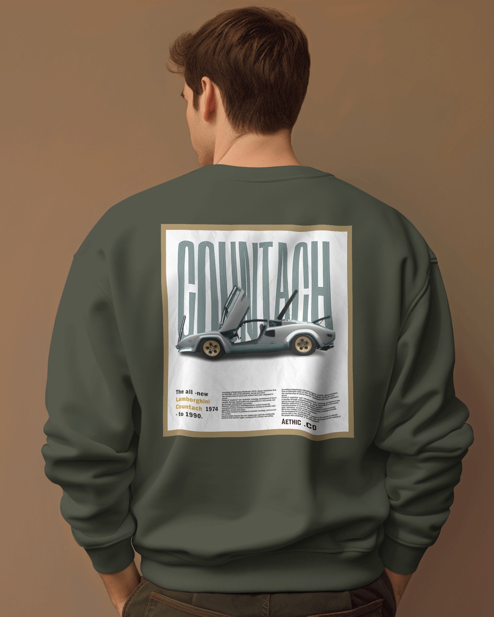 Back view of green sweatshirt featuring Lamborghini Countach vintage car print